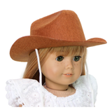 A brown cowboy hat designed for 18-inch dolls, displayed on a doll with a white outfit.