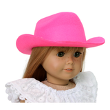 A doll wearing a hot pink cowboy hat designed for 18-inch dolls.