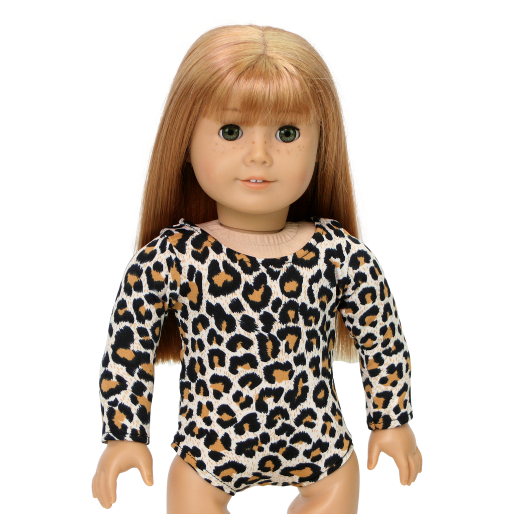 An 18-inch doll wearing a long-sleeved leopard print leotard.