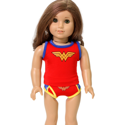 18-in doll in a two-piece Wonder Woman-style knit underwear set, featuring a red and gold superhero-inspired logo on both top and bottom.