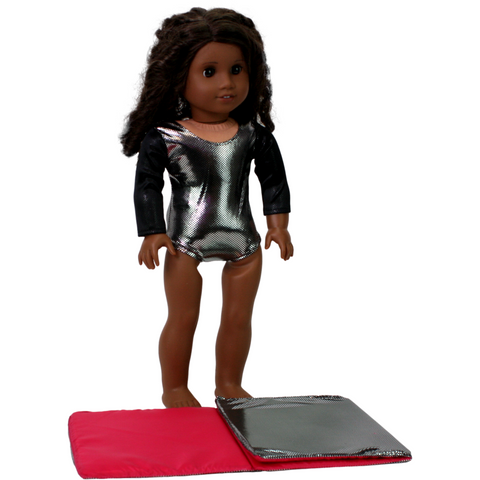 Silver and black shimmer leotard for 18" dolls, featuring contrasting black sleeves for a sleek look. Includes a reversible exercise mat for practice and play.
