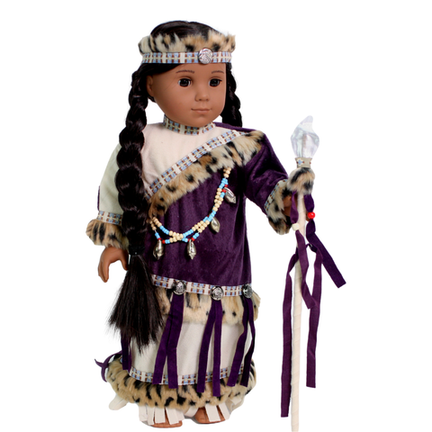 An 18-inch doll dressed in a Native American-inspired purple outfit, including a fringed and beaded dress, a headband, and a fabric-tipped spear.