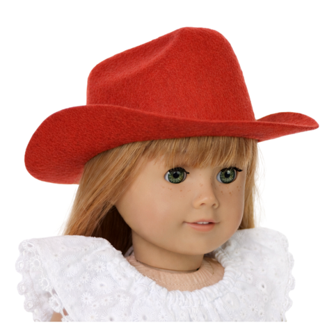 An 18" Doll wearing a red cowboy hat and white lace top on a white background