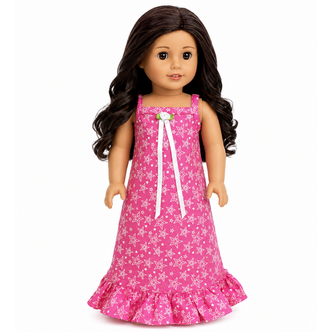 18" doll wearing a pink sleeveless nightgown with white stars, ribbon and rose accent, and ruffled hem